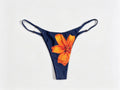 Velora Swim Serafina Bottoms in vibrant floral print, featuring adjustable side ties and a high-waisted design for a stylish beach look.